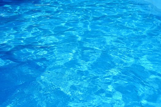 Pool with clean water. Summer background for traveling.