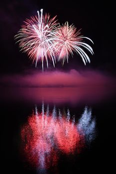 Beautiful colorful fireworks on water. Brno dam.
International Fireworks Competition Ignis Brunensis. Brno - Czech Republic - Europe.