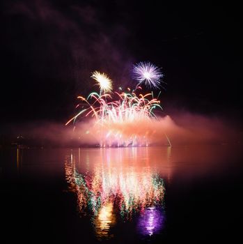 Beautiful colorful fireworks on water. Brno dam.
International Fireworks Competition Ignis Brunensis. Brno - Czech Republic - Europe.