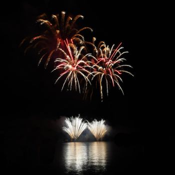 Beautiful colorful fireworks on water. Brno dam.
International Fireworks Competition Ignis Brunensis. Brno - Czech Republic - Europe.