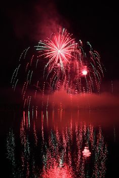 Beautiful colorful fireworks on water. Brno dam.
International Fireworks Competition Ignis Brunensis. Brno - Czech Republic - Europe.