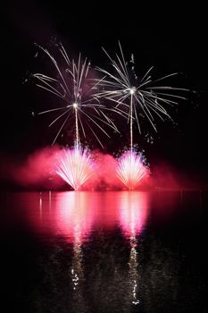 Beautiful colorful fireworks on water. Brno dam.
International Fireworks Competition Ignis Brunensis. Brno - Czech Republic - Europe.