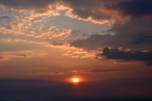 Beautiful sunset - sunrise with clouds. Sky with clouds. Colorful natural background.