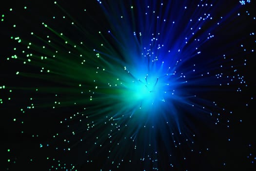 Colorful abstract background. Lamp with optical fibers.