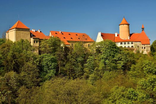 Beautiful Gothic castle Veveri. The city of Brno at the Brno dam. South Moravia - Czech Republic - Central Europe.
