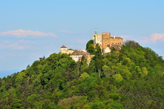 Beautiful old castle Buchlov. South Moravia-Czech Republic-Europe. Spring landscape with forests, castle and blue sky.