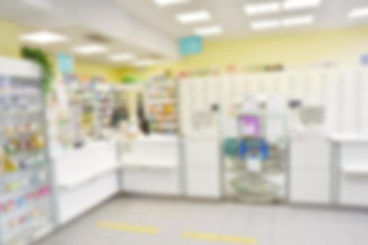 Pharmacy blurred background. Pharmacy store drugs shelves interior blurred background