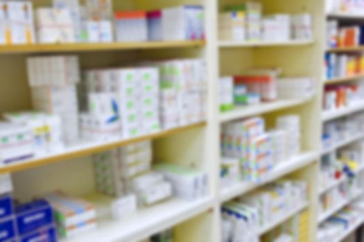 Pharmacy blurred background. Pharmacy store drugs shelves interior blurred background