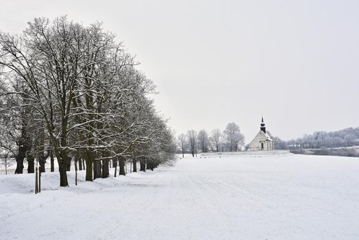 Winter landscape with a beautiful chapel near castle Veveri. Czech Republic city of Brno. The Chapel of the Mother of God.