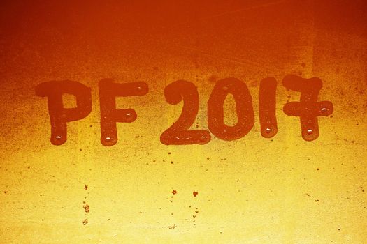 PF 2017 written on a misty window. Background for the celebration of the New Year 2017