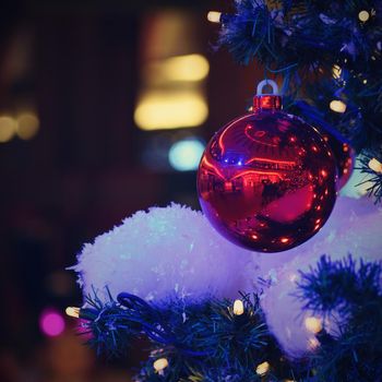 Colorful christmas Decoration. Winter holidays and traditional ornaments. Lighting chains-bulbs for seasonal background.