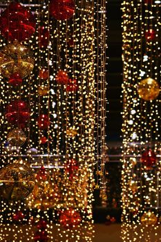 Colorful christmas Decoration. Winter holidays and traditional ornaments. Lighting chains-bulbs for seasonal background.
