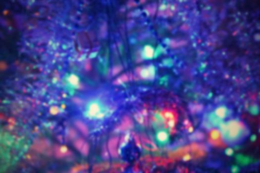 Blurred xmas background, christmas texture and background from color lights.