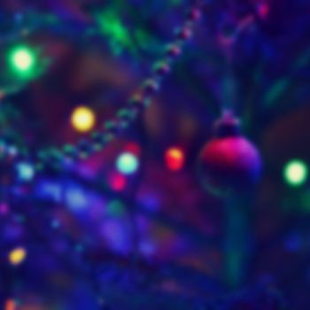 Blurred xmas background, christmas texture and background from color lights.