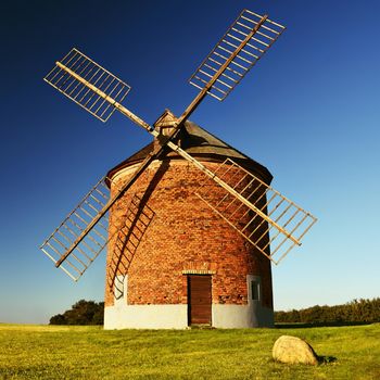 Beautiful old windmill and landscape with the sun. Chvalkovice - Czech Republic. Europe.