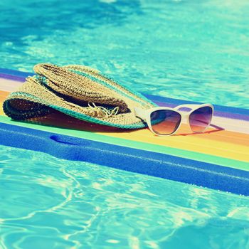 Pool with clean water. Summer background for traveling.