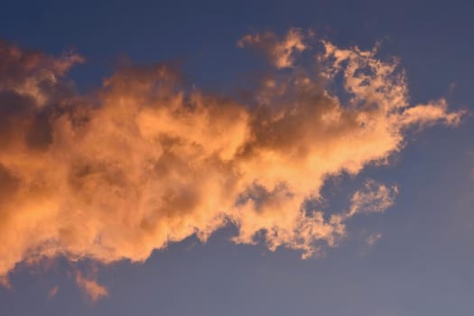 Sunset clouds with sun setting down