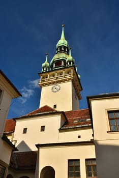 The city of Brno. - Czech Republic - Europe. Gate of the Old City Hall. A photo of the beautiful old architecture and tourist attraction with a lookout tower. Tourist Information Center.