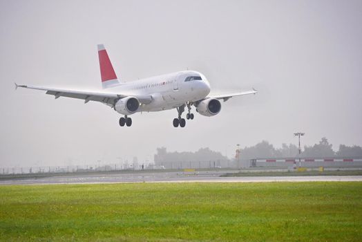 Airplane on the runway. Landing - take off at the airport