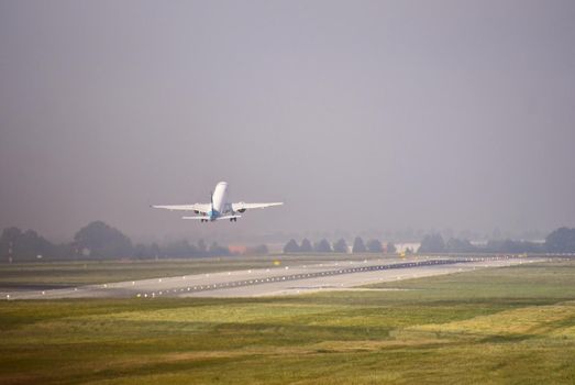 Airplane on the runway. Landing - take off at the airport