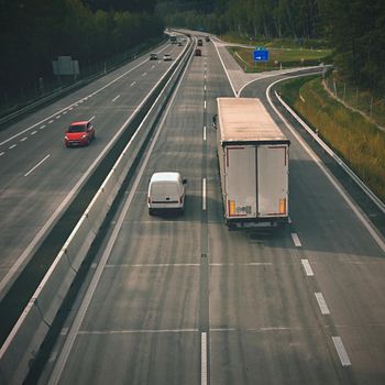 Cars on highway in traffic jam.