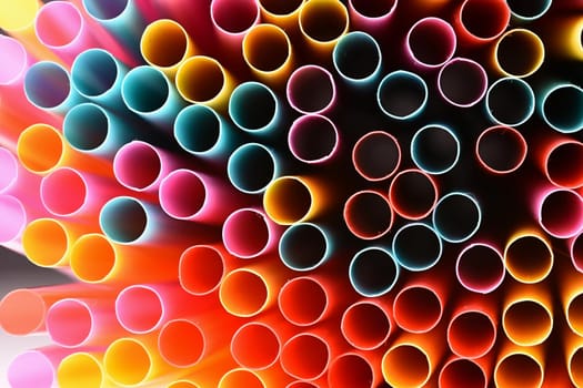 Straws. Macro abstract image with beautiful multi-colored background.