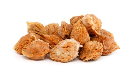 handful of wet peach seed with pulp leftovers isolated on white background