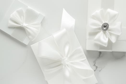 Romantic celebration, lifestyle and holiday present concept - Luxury wedding gifts on marble