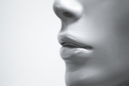 Portrait of female lips of a mannequin. No people