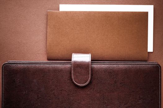 Productivity, work and corporate lifestyle concept - Vintage business briefcase on the office table desk, flatlay background