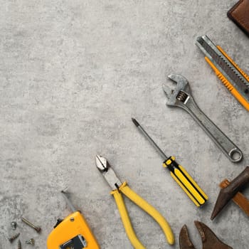 Top view design concept of Father's day and labor day with working tools on blue background.