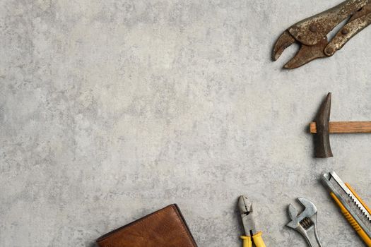 Top view design concept of Father's day and labor day with working tools on blue background.