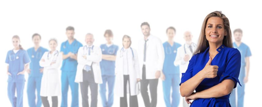 Happy female patient with thumb up and team of doctors isolated on white background