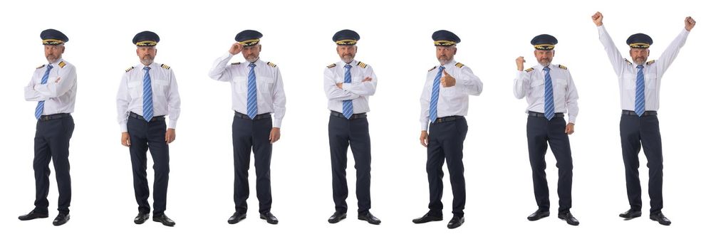 Photo of an airline pilot wearing the four bar Captains epaulettes, firlst pilot, aircraft commander, isolated on white background, set of full length portraits