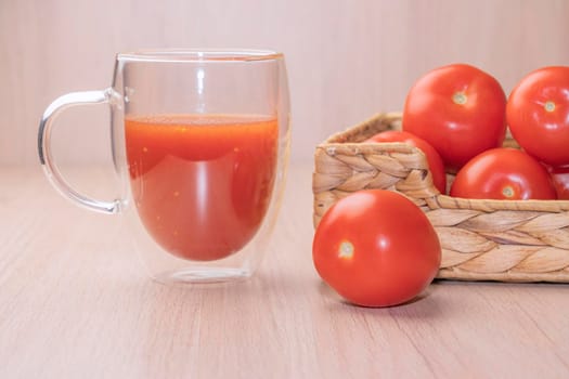 tomato juice and red tomatoes close up. High quality photo