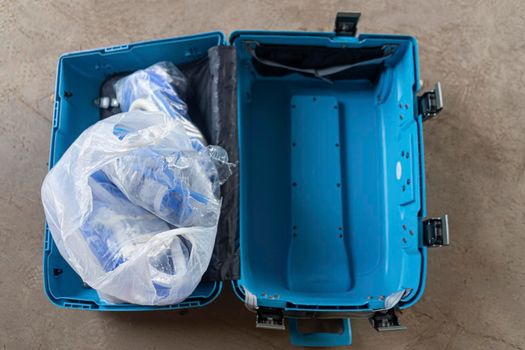 Blue plastic box Used for carrying medical items.