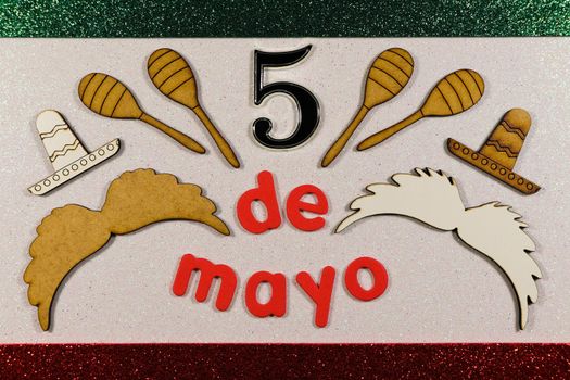 Cinco de Mayo celebration theme layout with maracas moustache and sombreros