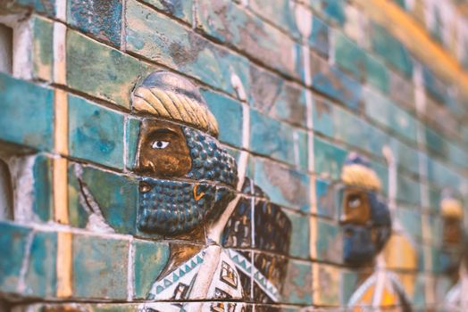 brick wall relief with row of guards from ancient Assyria