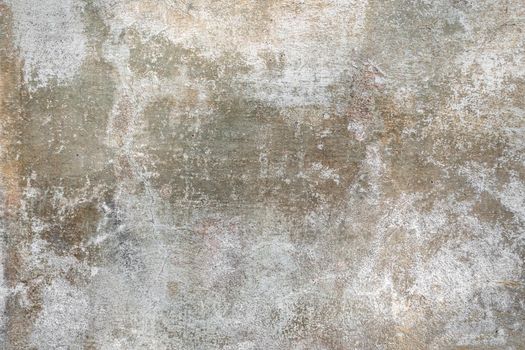 White green red old wall with damaged plaster.
Old shabby wall with peeling plaster.