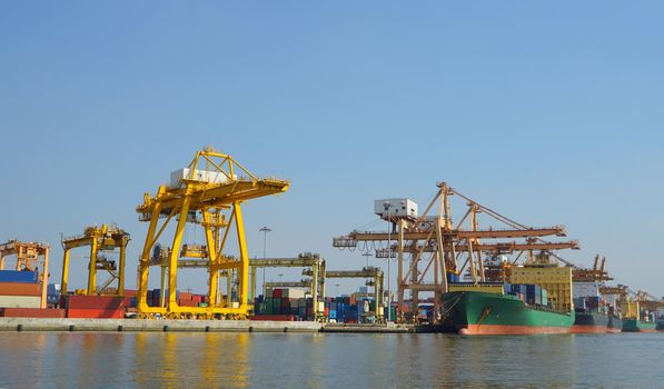 Commercial Ship or vessel at international harbor for logistics transportation
