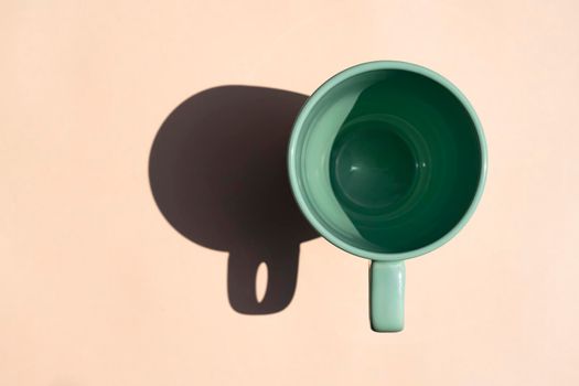 a circle with a hard shadow on a colored background. High quality photo