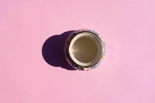 vase with a hard shadow on a colored background. High quality photo