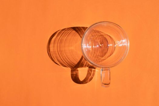 a circle with a hard shadow on a colored background. High quality photo