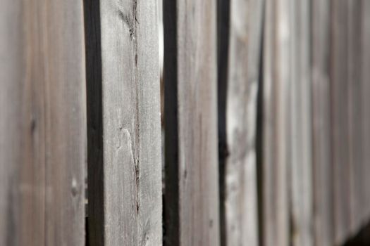  Wooden sections or pieces create a fence or barrier