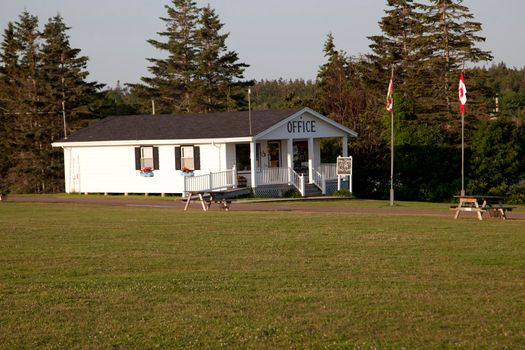 Cavendish, PEI- July 27, 2019: Early morning light on the registration building at a PEI campground