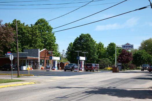 June 4, 2018- Middleton, Nova Scotia: The unique looking Irving Gas Station on Main Street, Middleton, Nova Scotia with customers pumping gasa