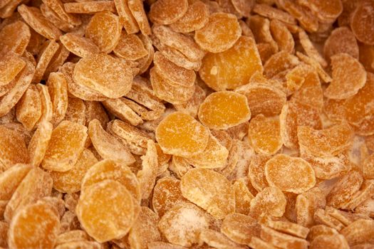  crystallized ginger slices in a bin 