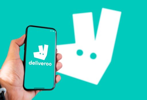 London, UK, April 2021: The Deliveroo logo on a phone screen. Deliveroo is an online food delivery company and listed on the London Stock Exchange on 31 March 2021 as Deliveroo Holdings plc