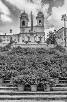 Idillic view of the Church of Trinita dei Monti, iconic landmark at the top of the Spanish Steps in Piazza di Spagna, one of the most famous squares in Rome, Italy