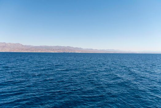 A view of the coral reef above the water. The Red Sea. Beach in the city of Eilat, Israel High angel. High quality photo